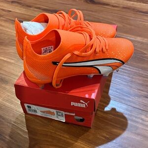 PUMA women’s/Kids Bright Orange Soccer shoes